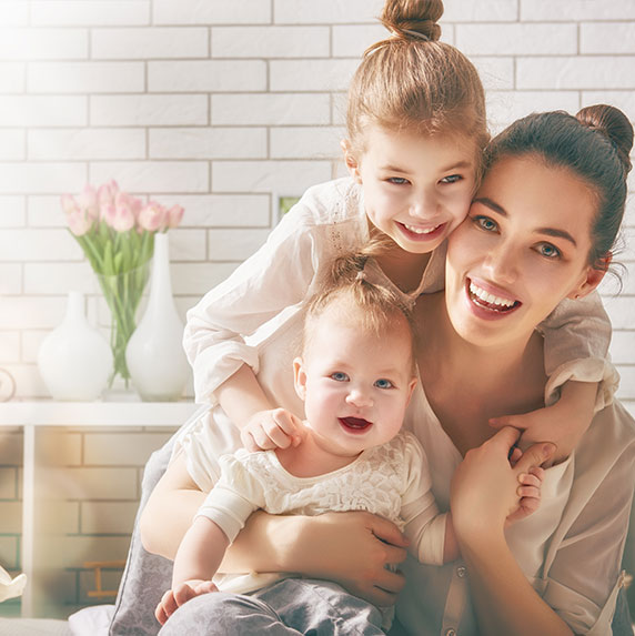 mother reading to daughter